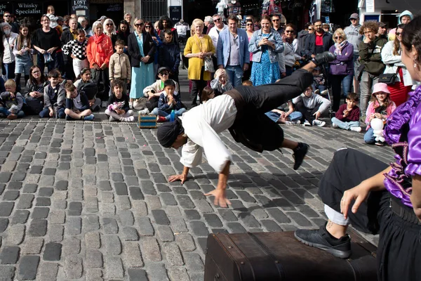 Edinburgh Festival Fringe 2022-5 Aug-29 Aug Edinburgh UK. Performers on the street. Actors of street theater and musicians in capitol of Scotland. A comedy actors perform on the Royal Mile. 