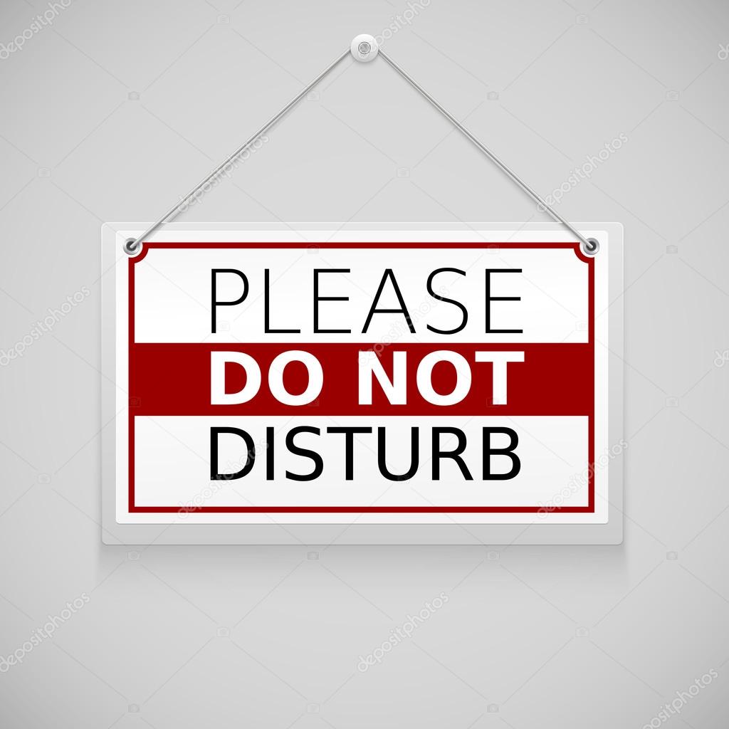 Please do not disturb, sign hanging on the wall