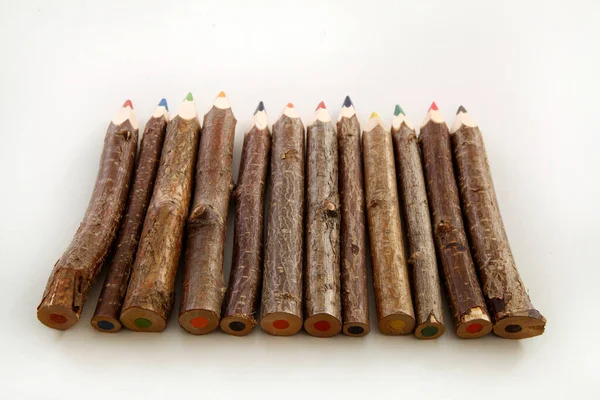 colourful pencils natural wood on white background studio sharp tip