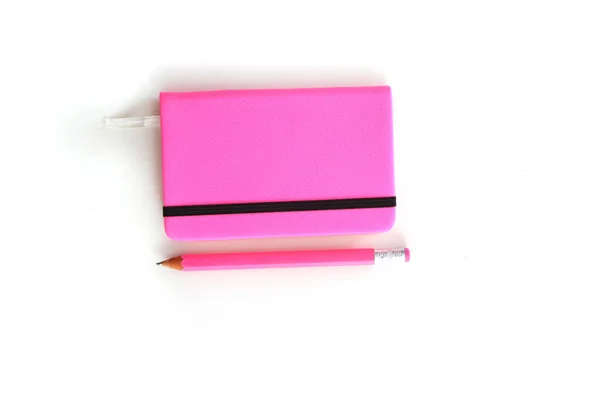 Notebook Rosa Con Matite Vista Dall Alto Sfondo Bianco — Foto Stock