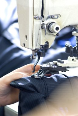 tailor's hands sewing clipart