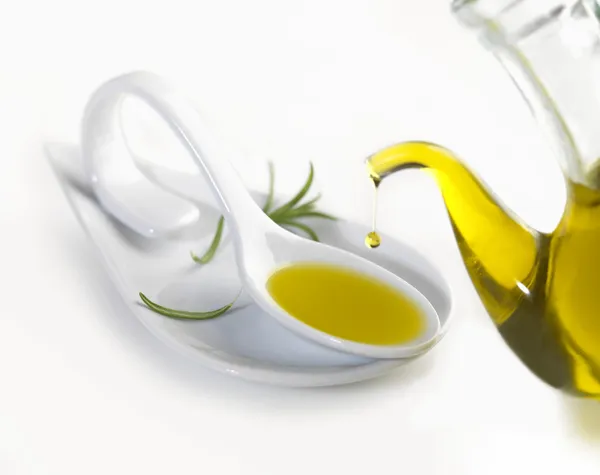 Łyżkę oliwy z oliwek pierwszego tłoczenia Obrazek Stockowy