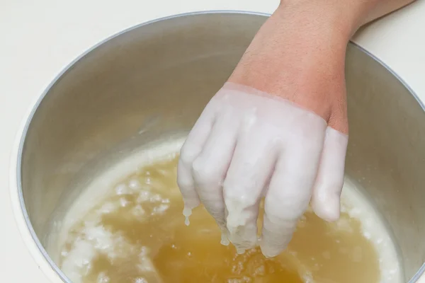 Physical therapy treatment and beauty,Hand in paraffin bath — Stock Photo, Image