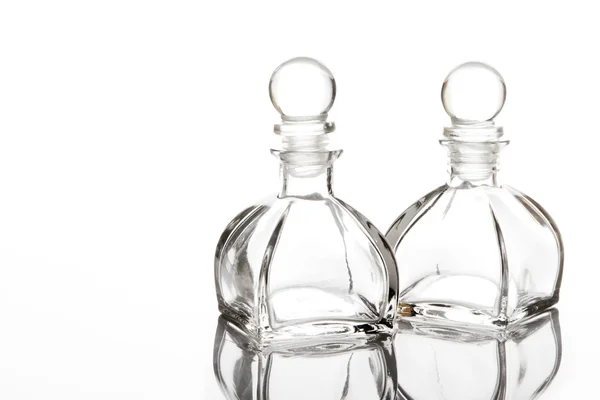 Empty glasses bottle on isolate — Stockfoto