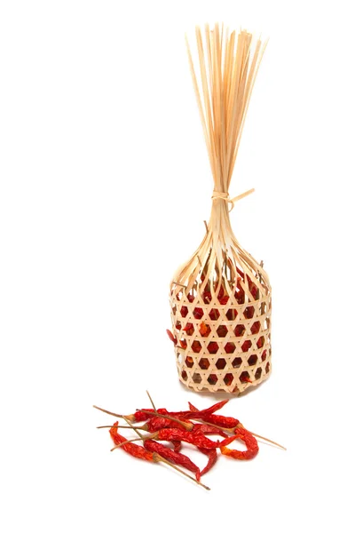 Dry chilli in wicker round bamboo basket — Stock Photo, Image