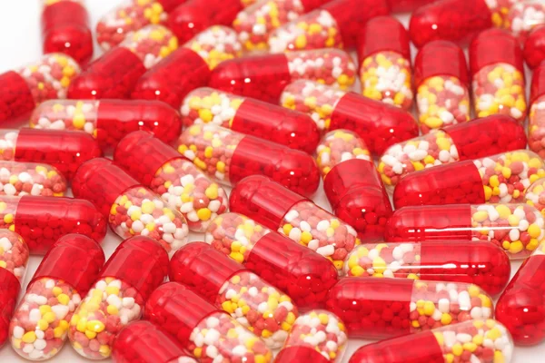 Colourful medical pills background — Stock Photo, Image