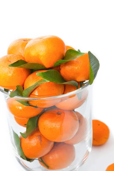 Naranjas en un tazón de vidrio — Foto de Stock