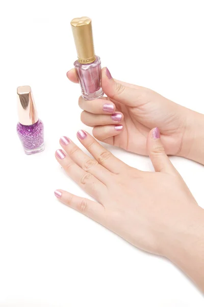 Mani donna con smalti per unghie — Foto Stock