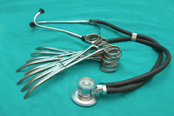 Stethoscope and surgery instrument set — Stock Photo, Image