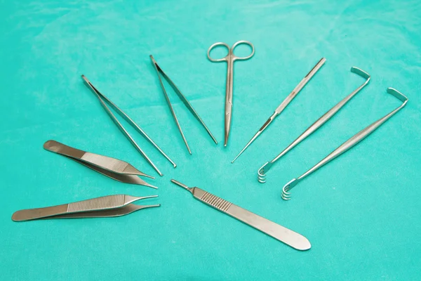 Set of surgical instrument on sterile table — Stock Photo, Image