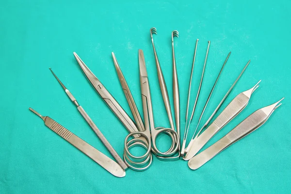 Set of surgical instrument on sterile table — Stock Photo, Image