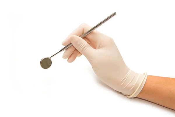 Dentist hand and dental tool — Stock Photo, Image