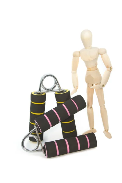 Squeezing hand coil exercise equipment with wooden modle dummy — Stock Photo, Image