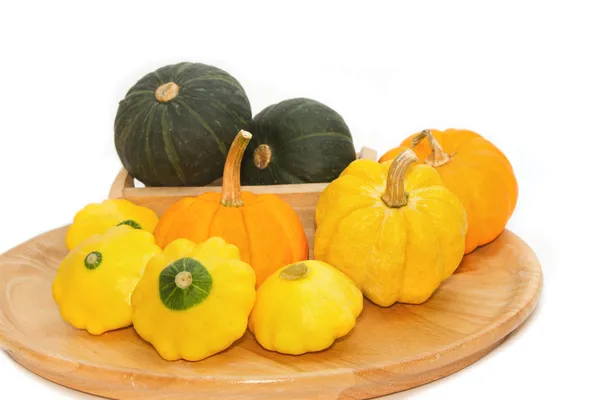 Yellow Patty Pan And Pumpkin on the wooden tray — Stock Photo, Image