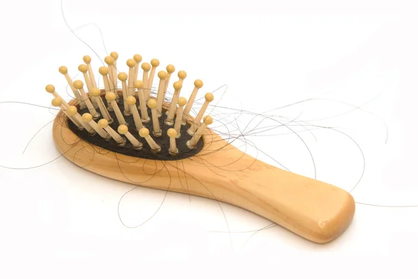 Escova de pente com cabelo perdido — Fotografia de Stock