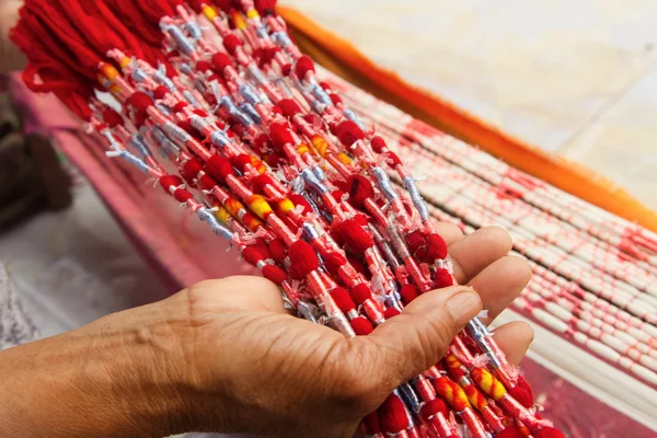 Tie dye technique of threads before weaving clothes at Asian tex — Stock Photo, Image