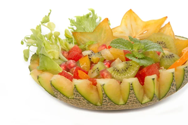 Ensalada de frutas en el melón fruta, alimentos de fusión —  Fotos de Stock