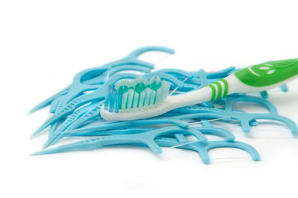 Dental care ,Pile of dental floss pick and toothbrush — Stock Photo, Image