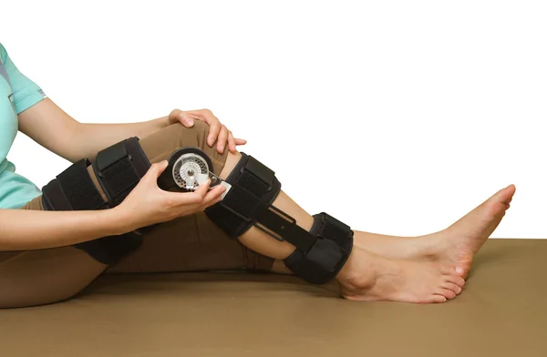 Adjustable angle knee brace support for leg or knee injury — Stock Photo, Image