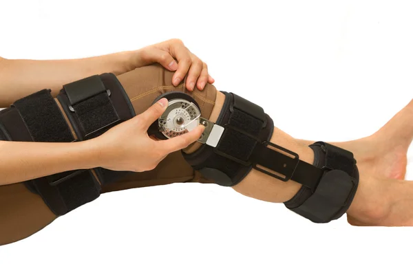 Adjustable angle knee brace support for leg or knee injury — Stock Photo, Image