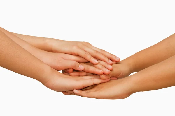 Hands on top of each other showing  unity with their hands toget — Stock Photo, Image