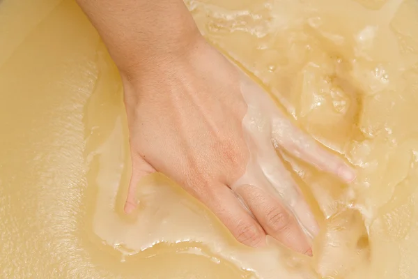 Paraffin hand bath , Spa hand treatment at spa salon — Stock Photo, Image