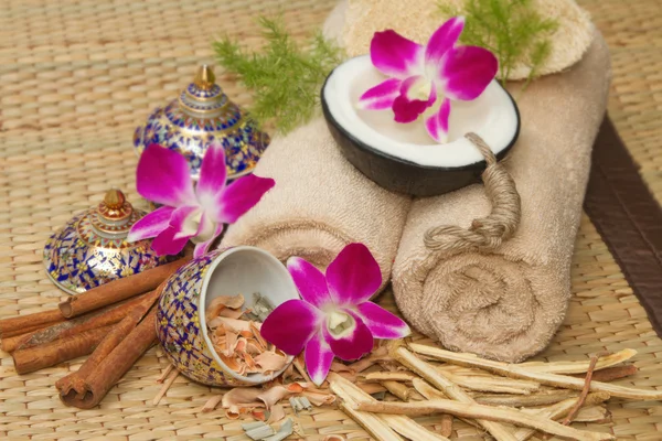 Thai spa massage setting with spa  essential oil , towel, herb , — Stock Photo, Image