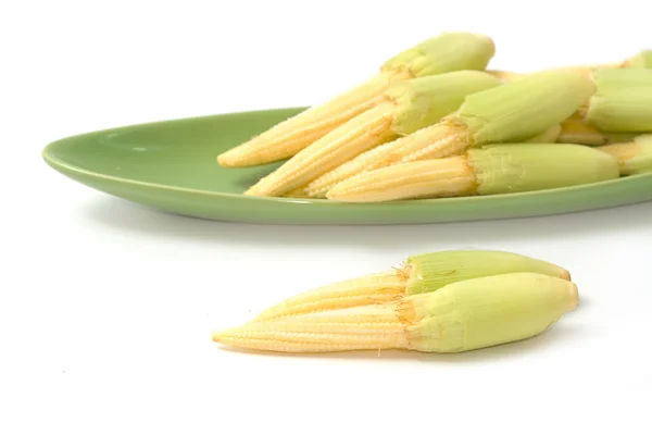 Baby corn in the green plate — Stock Photo, Image