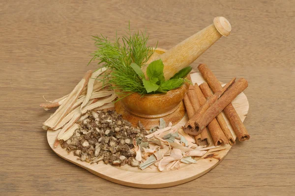 Mortar and pestle with herb — Stock Photo, Image