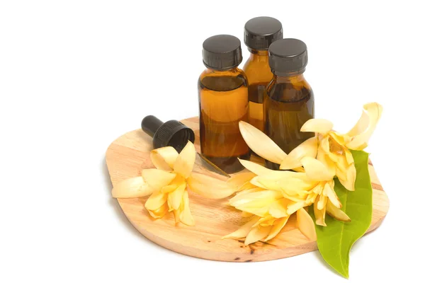 Essential aroma oil with champaka flower — Stock Photo, Image