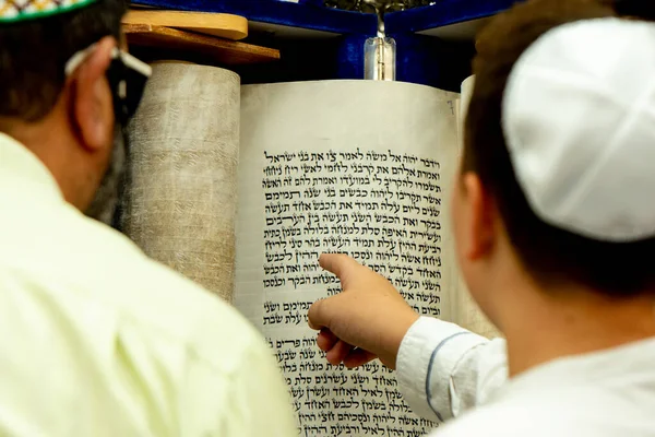 Bar Mitzvah celebration in the city synagogue. A young man conducts a festive bar mitzvah ceremony. Israeli village Shlomi June 29, 2022
