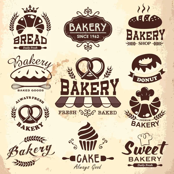 Collection of vintage retro bakery logo badges and labels — Stock Vector