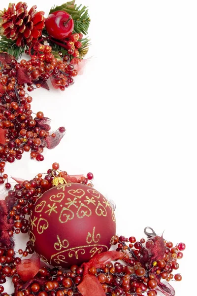 Red christmas frame of berries with filigree on ball Stock Image