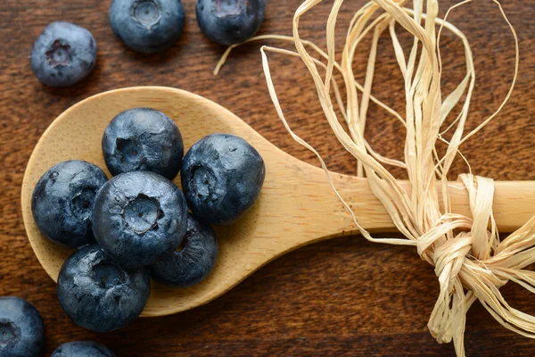 Blueberries on a Wooden Spoon — Stock Photo, Image