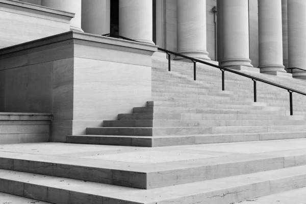 Pillars and Stairs leading up to a door — Stock Photo, Image