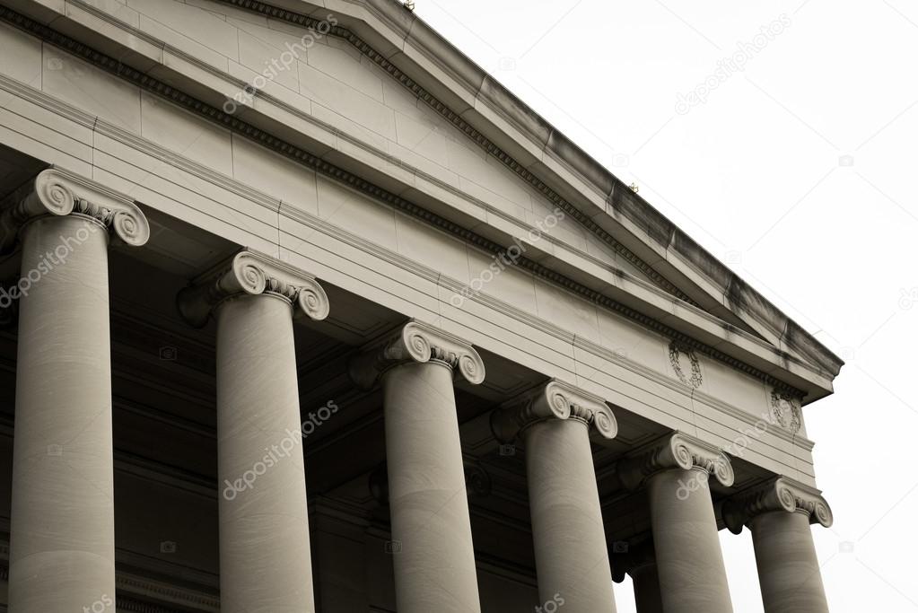 Public Building with Stone Pillars and White Background