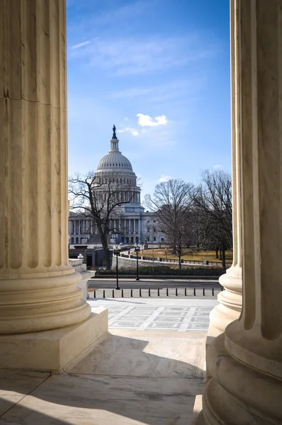 View of Capitol Hill through the Supreme Court Stock Photo