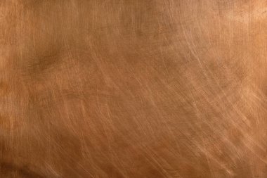 Bakır arka plan. Sağa ışık. Boşluğu kopyala.