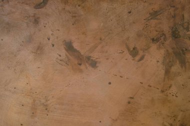 Lekeli ve çizikli kaba bakır zemin.