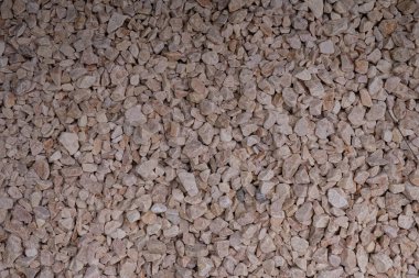 Pembe ezilmiş taşlar. Tasarım için doğal taşlar.