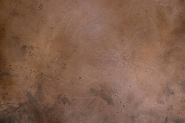 Grunge copper background with blurred effect. Copy space.