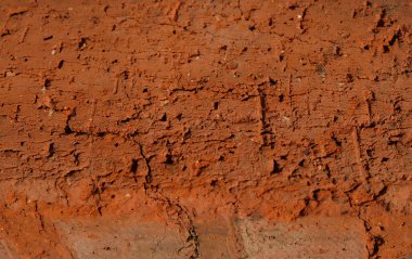 Yanmış kil tuğla. Doğal yapı malzemeleri, konsept. Seçici odaklanma. Boşluğu kopyala.