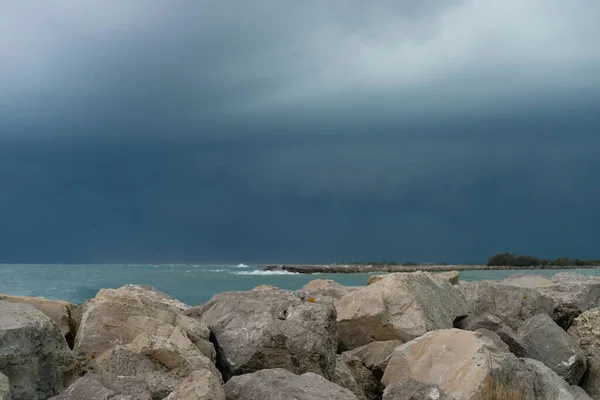 The beginning of a thunderstorm. Epic landscape. Mediterranean Sea. Saintes-Maries-de-la-Mer, Camargue, France.