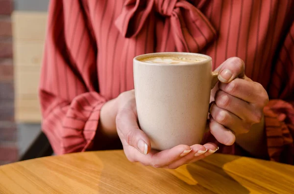 Young Female Hands Holding Hugging Cup Coffee Latte Art Wooden — Stock Photo, Image