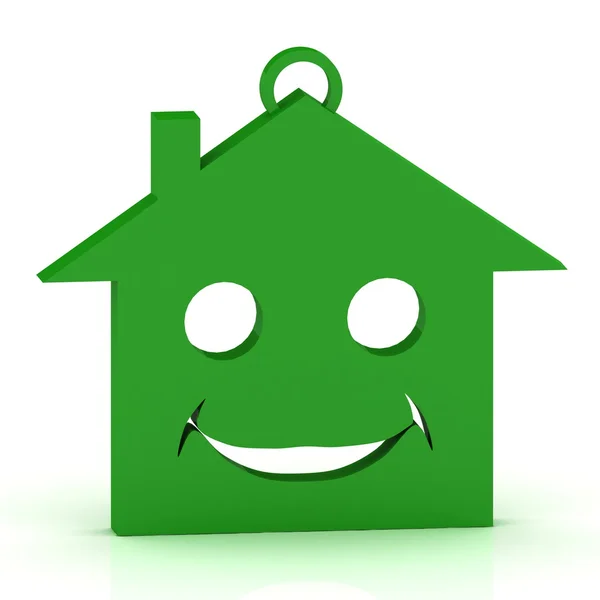 Keychain green house with a beautiful smile — Stock Photo, Image