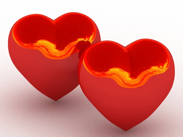 两个用火的反射发光红色的心 — 图库照片