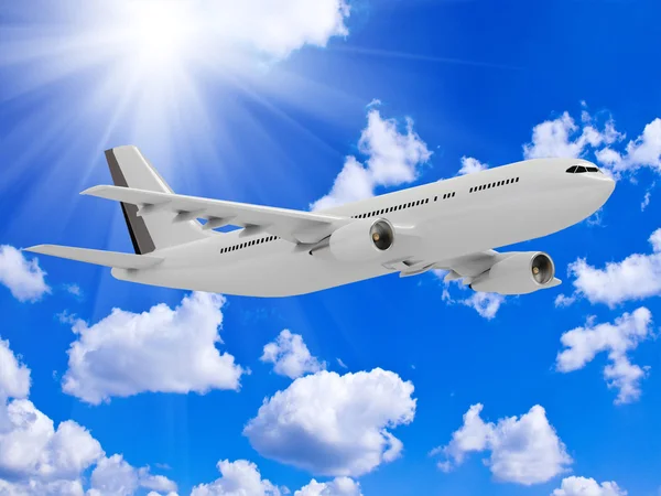 White passenger airliner flies under the bright sun — Stock Photo, Image