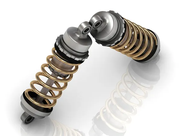 Two automotive shock absorber with golden springs — Stock Photo, Image