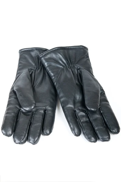 Пара черных кожаных перчаток — стоковое фото