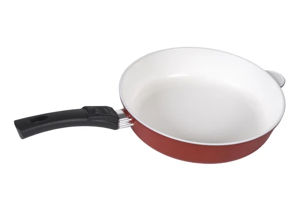 Красная сковородка с керамическим покрытием  . — стоковое фото